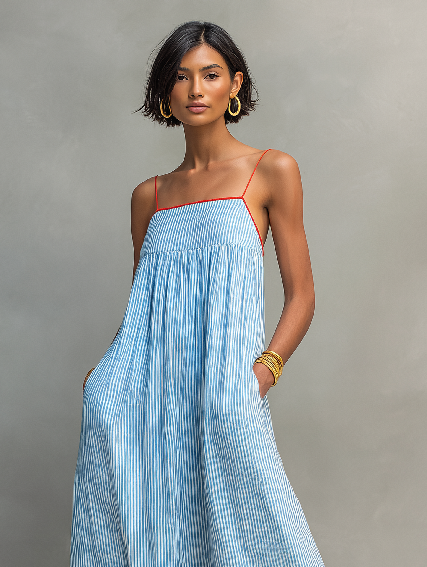 Nora · Vestido azul fluido con bolsillos