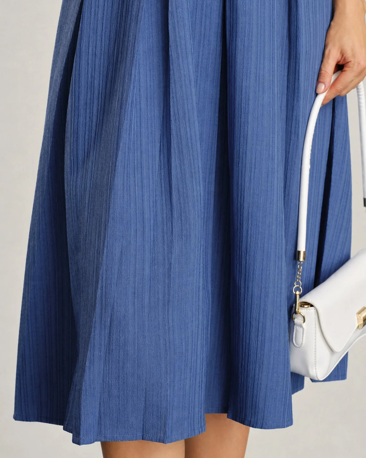 DALIA | Vestido midi plisado a cuadros marrones con botones