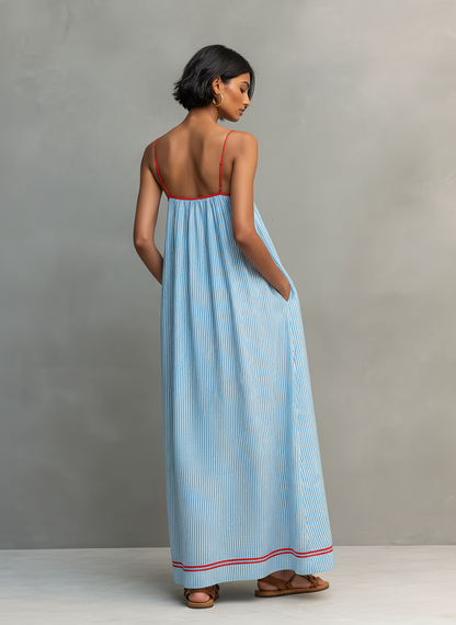 Nora · Vestido azul fluido con bolsillos